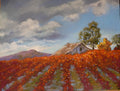 Painting of a landscape with a house, tree, and red vineyard under a blue sky with clouds.yard  