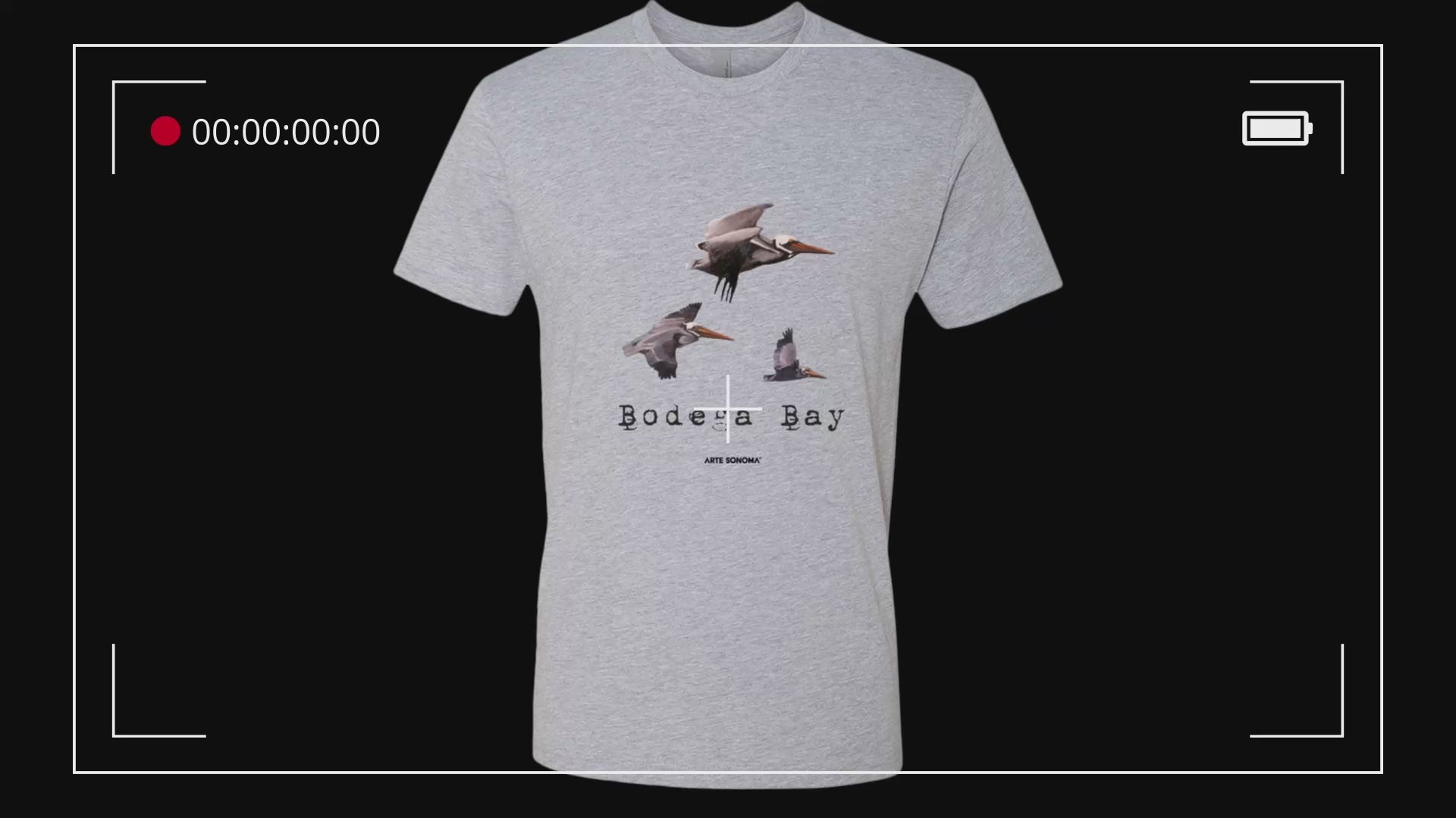 "Bodega Bay Pelicans T-Shirt — heather grey 100% cotton tee featuring original pelican artwork by Sonoma County artist Andrea Cleall"